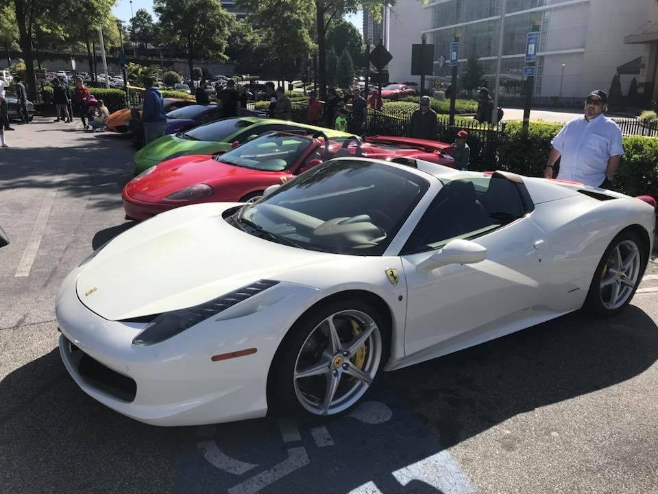 Very nice looking Ferrari 458 spyder with an gorgeous brown leather interior. The owner owns a horse ranch and he said the leather reminded him of most of their saddle colors, and he just couldn't resist buying the "Pranci