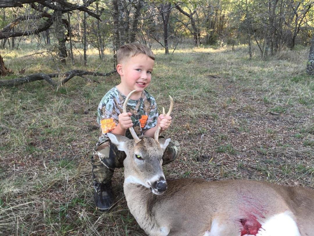 My great nephew with his deer