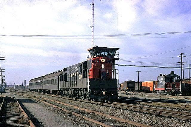 SP  F-M H66-24 Train Master #3026 has Train #118 in tow passing thru Newhall Yard in San Jose.  Spring of 1966.