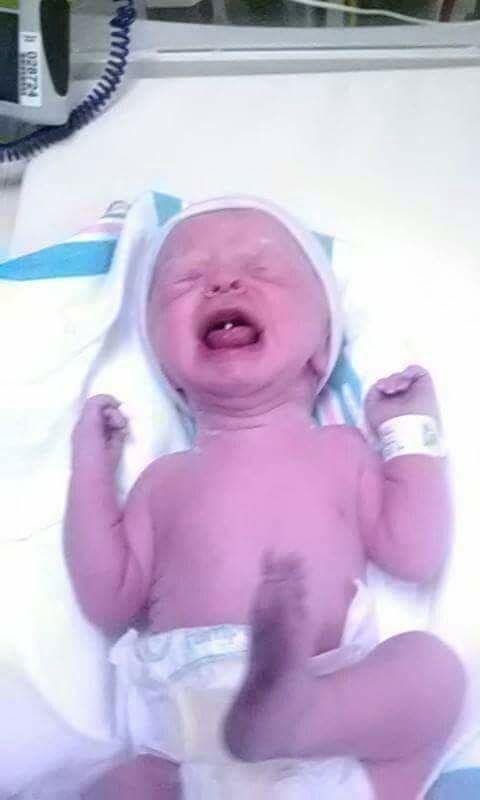 All 5 pounds and 11 ounces of her