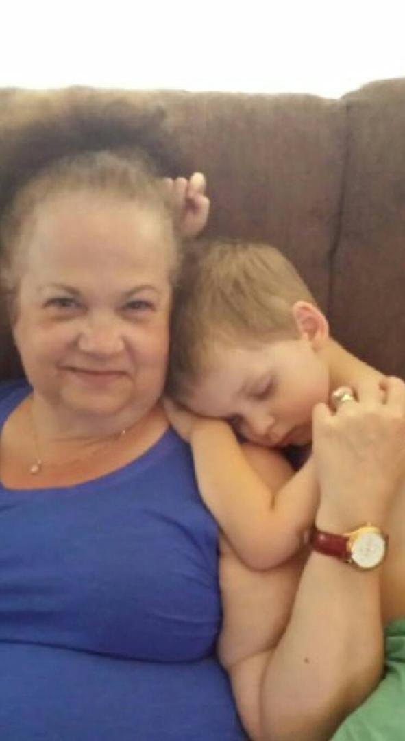 Mema's little man snoozing on her shoulder. Love, love, love you!