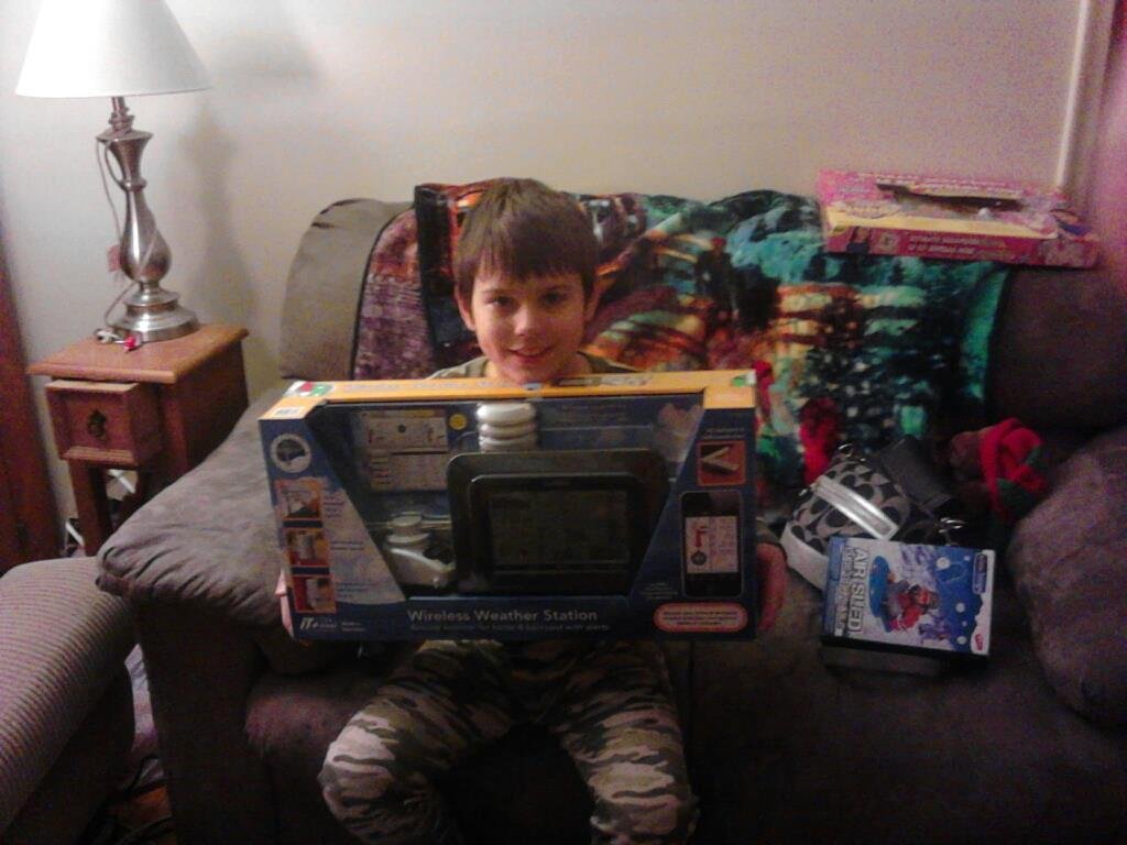Connor and his weather station on Christmas morning
