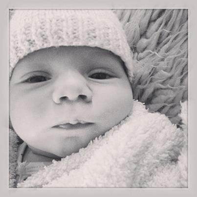 A little package of cuteness. Astrid is very alert for a week old baby.