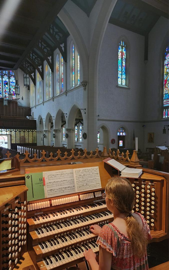 Our daughter Mariia practicing the organ, her third University major.