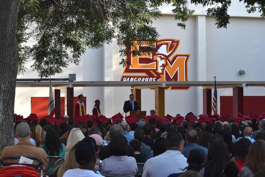 Yours truly presenting the 2018 Vanguard Scholar Athlete Scholarship Awards to the male and female winners at El Modena High School Baccalaureate June 10, 2018.  Nicholas Real (Basketball) and Hannah Habibi (Cross Country a