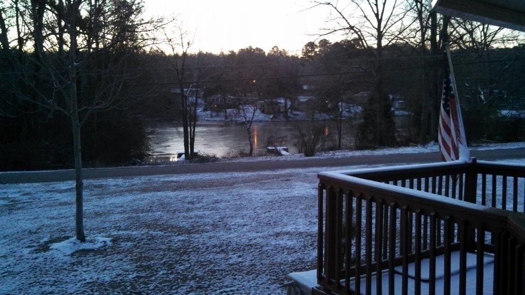 Wow, Pine Lake Frozen...  Yeap, that is what you see.  It is 7 degrees here and this lake is frozen.  I wonder who the Ducks went to visit while until it thaws out.?  I can just imagine what the roads look like.  Great news