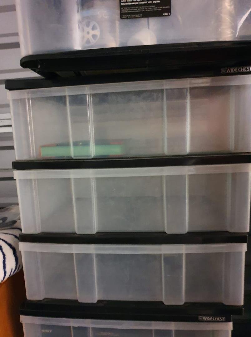 Set of 3 plastic drawers for storage.