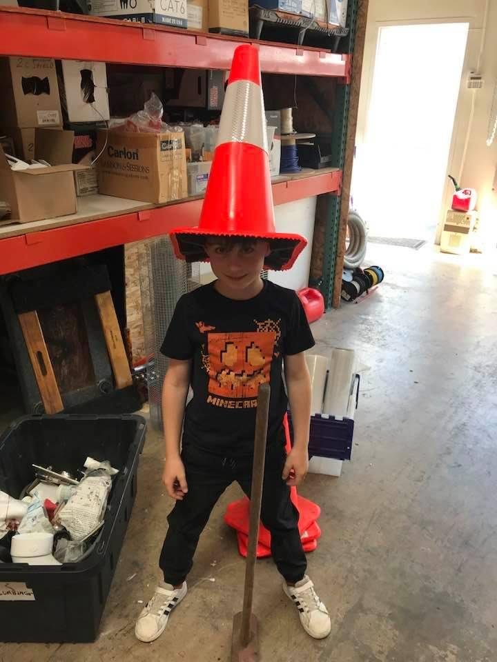 At least he has his safety helmet on! Ready to swing his big hammer.