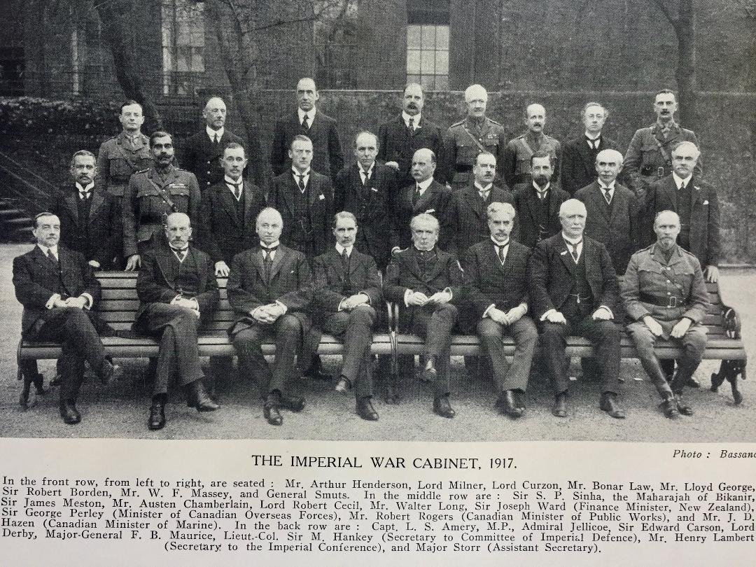Lord Milner is seated second from the left.