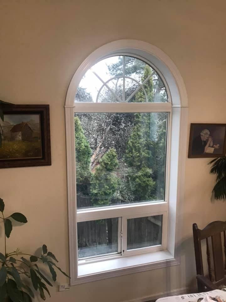 HOME REMODELING:
I finally got one of the curved windows trimmed with casing and molding. Now only three more to go…
