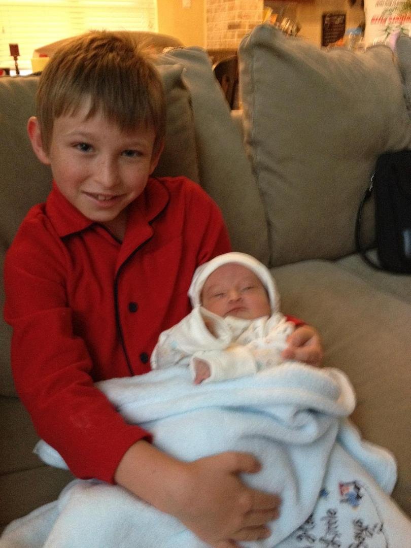 This is Noah holding his new brother, Samuel Alexander Marsh.