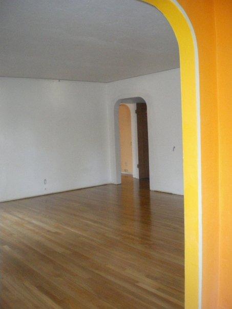 From front entry acroos living room. Hallway door has new arch opening.