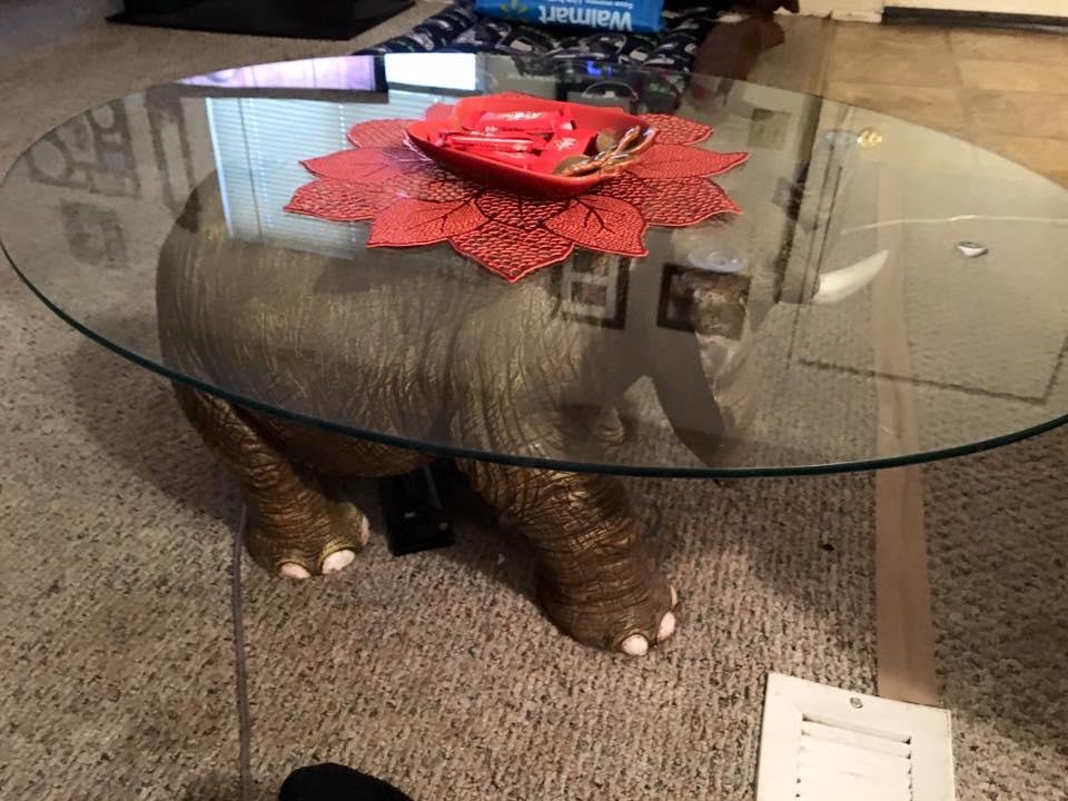 I was showing my cousin my elephant table. She collects them too.
