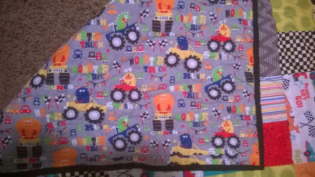 Just a fun quilt and pillowcase for my car and monster truck loving little guy.