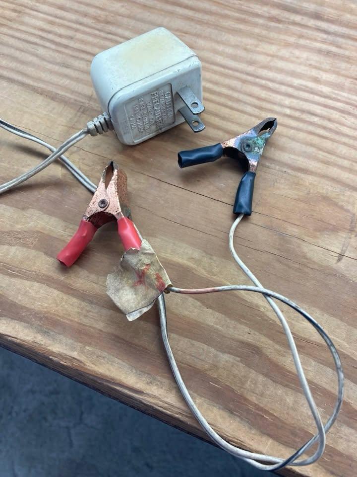 Today’s life saving tip: This is for people my age that are shoveling snow. Take one of those little transformers you have lying around from some electronic device that no longer works. Cut off the plug and attach some clip