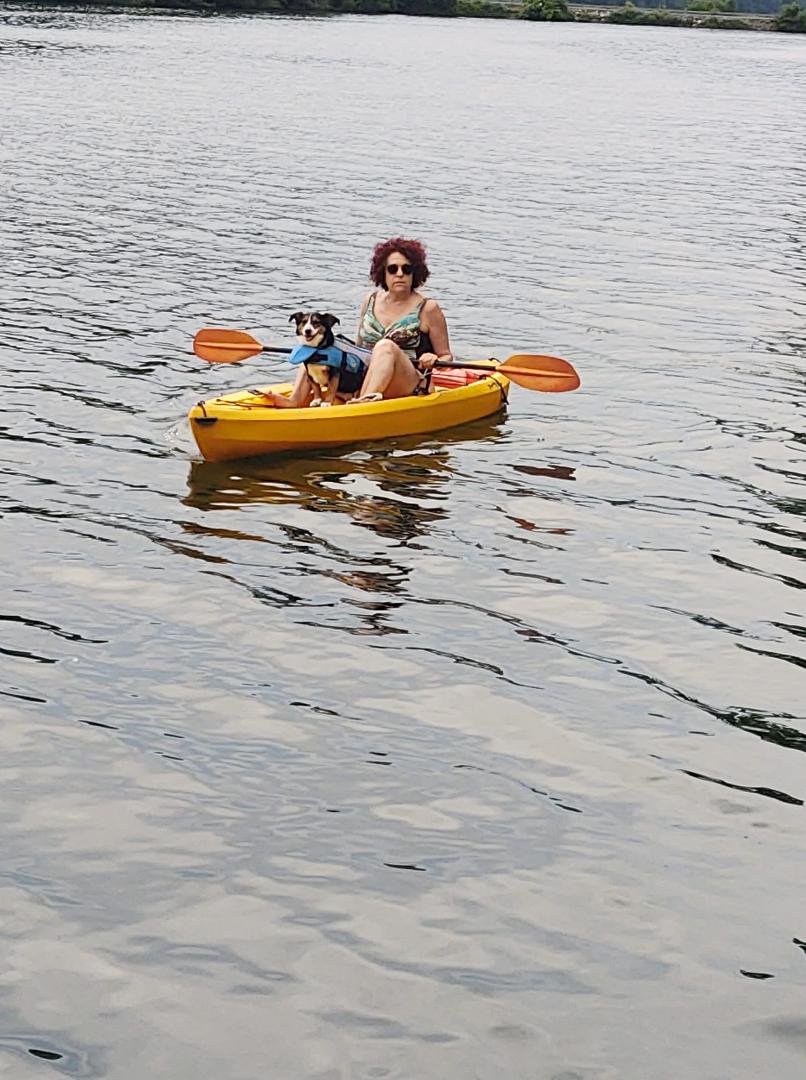 Sharon pulling into port with first mate Tyler.