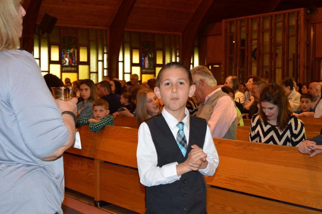 Our handsome grandson making his first Holy Communion.