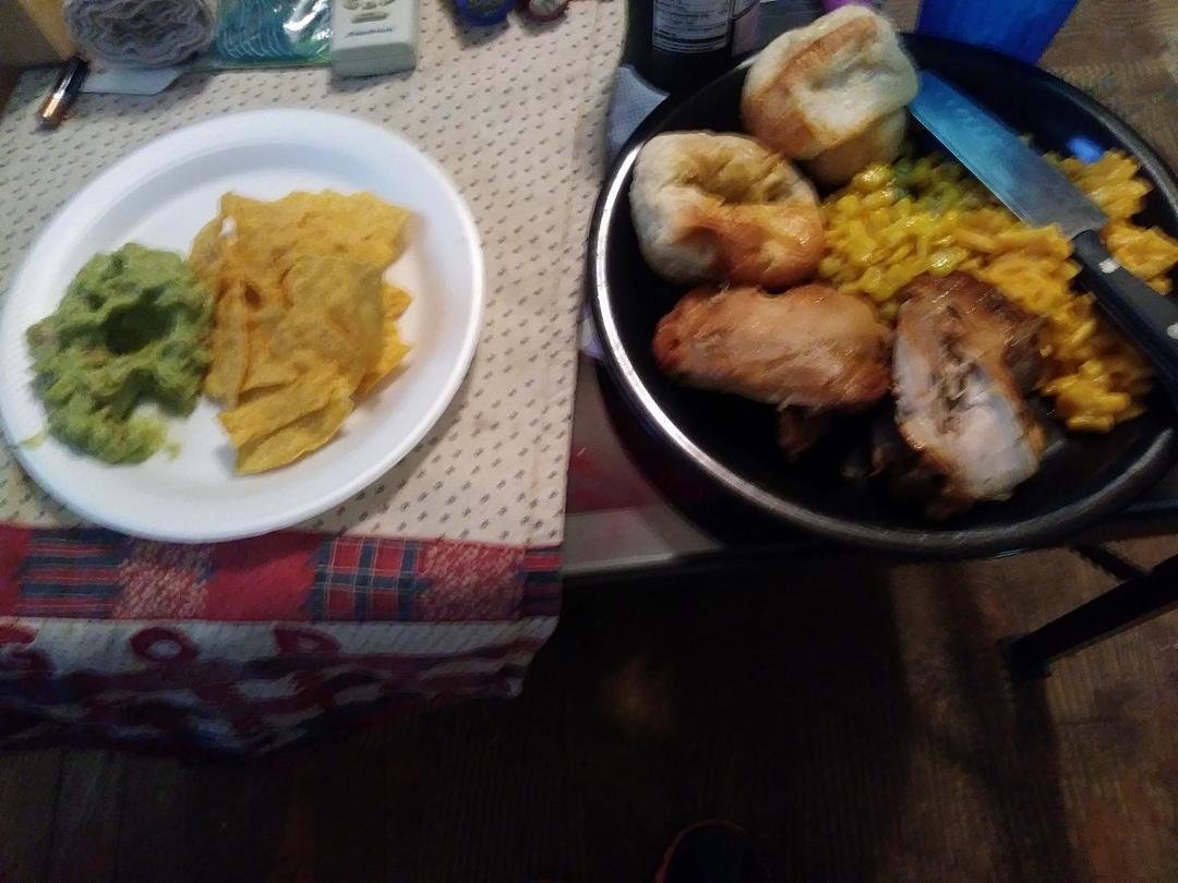 Hubby made dinner chips and gaucamole bbq chicken mac n cheese and corn and rolls.YUMMY