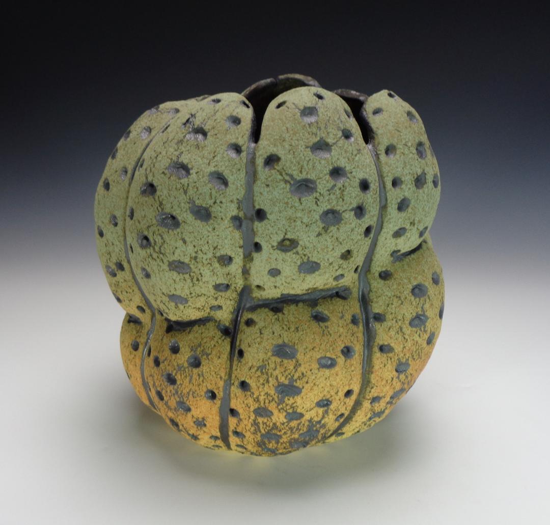 10" T, colored slips and oxide stain fired to cone 2