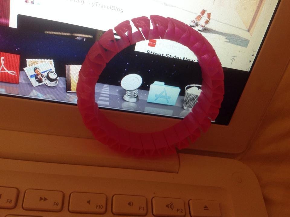 This pink bracelet was made on a $2000.00 3D printer. We got to see a demo at MicroCenter today. They load a spool of colored plastic, insert a picture from a computer program, and 15 minutes later, voila! A bracelet. Amazi