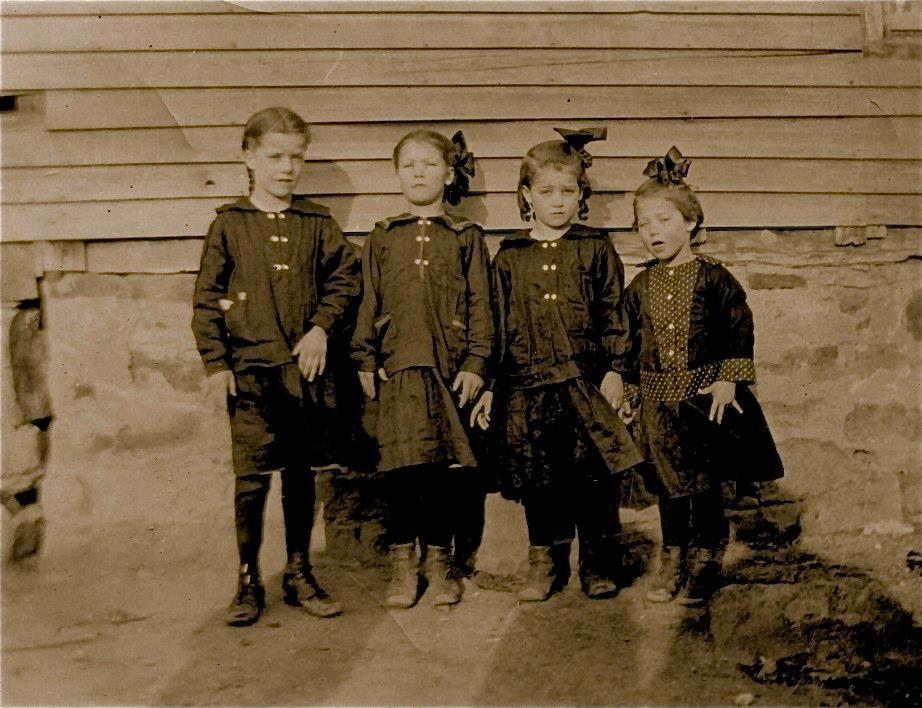 Four Jones Sisters (of Six) of 13 kids. Photo taken March 1918; Mom was about a year old. Mildred, closest to Mom in age and relationship, died as an early teen.