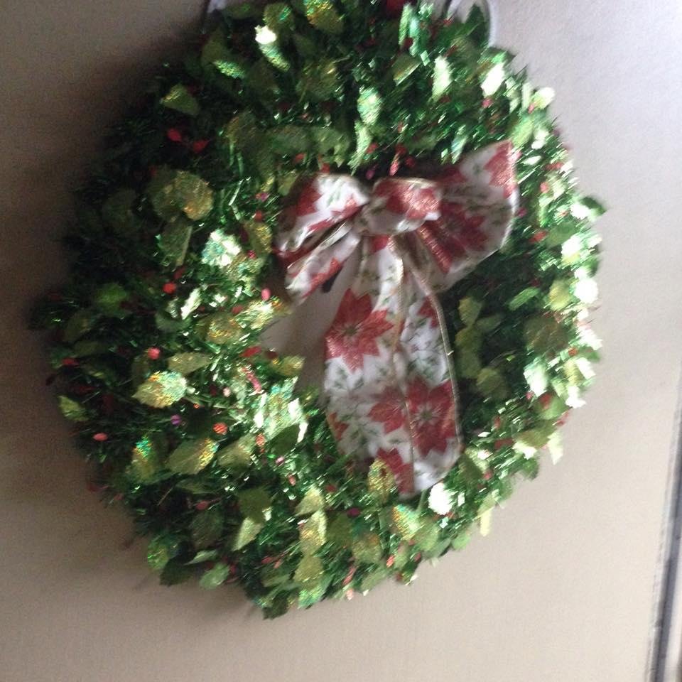 This is my Christmas wreath hanging on my door. Woohoo!!