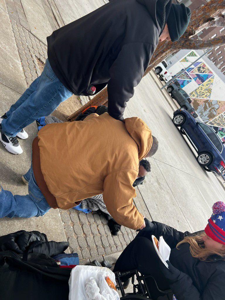 Steve Agee and friend feeding the homeless pizza as we prayed for them. Tulsa Oklahoma