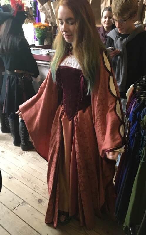 Emily shopping for a gown for her chorus group.