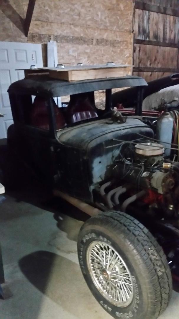 My 1930 Model A five window coupe ---- A wannabe street rod with a 68 Camaro drive train. Now belongs to Granddaughter Autumn Jutz and Hubby Matthew to get it done .