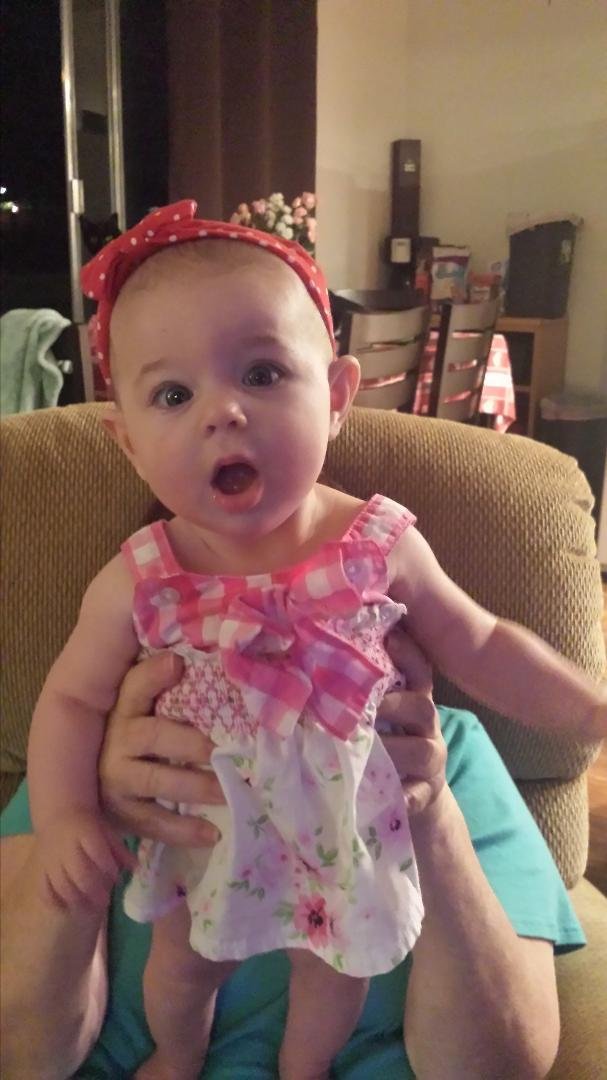 Emily watching the super bowl. She can't believe that play. LOL
