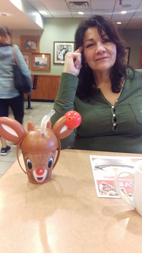 Susan might be a little embarrassed that I ordered my drink in a reindeer sippy cup...