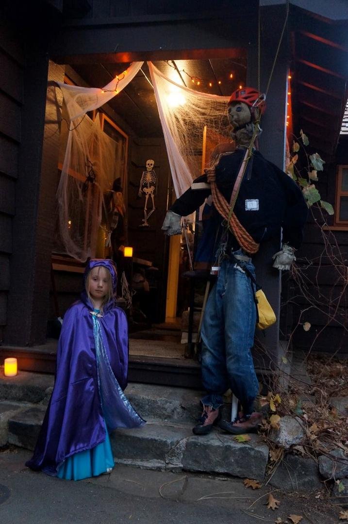 Princess P in her purple cape and hood...(she knows that purple is her gran's most favorite color right after red.) Looks as if someone did a bang up job of summoning the playful spirits to celebrate the All Hallowed Eve...