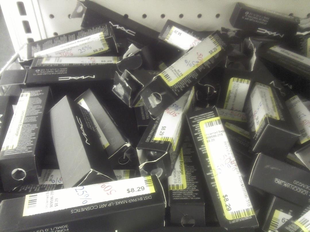 Came across this pic from the Unclaimed Baggage Center that I took in June.  They were selling MAC Studio Fix Fluid foundation for 4.15 (it cost 27.00 in the stores!).  Maybe it's the bargain hunter in me, but I think it ma