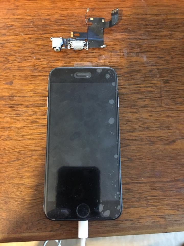 Not a good sign after replacing a charging port. :(