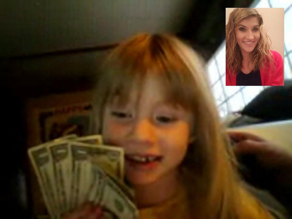 Violet showing her sister the "Tooth Fairy" came last night.