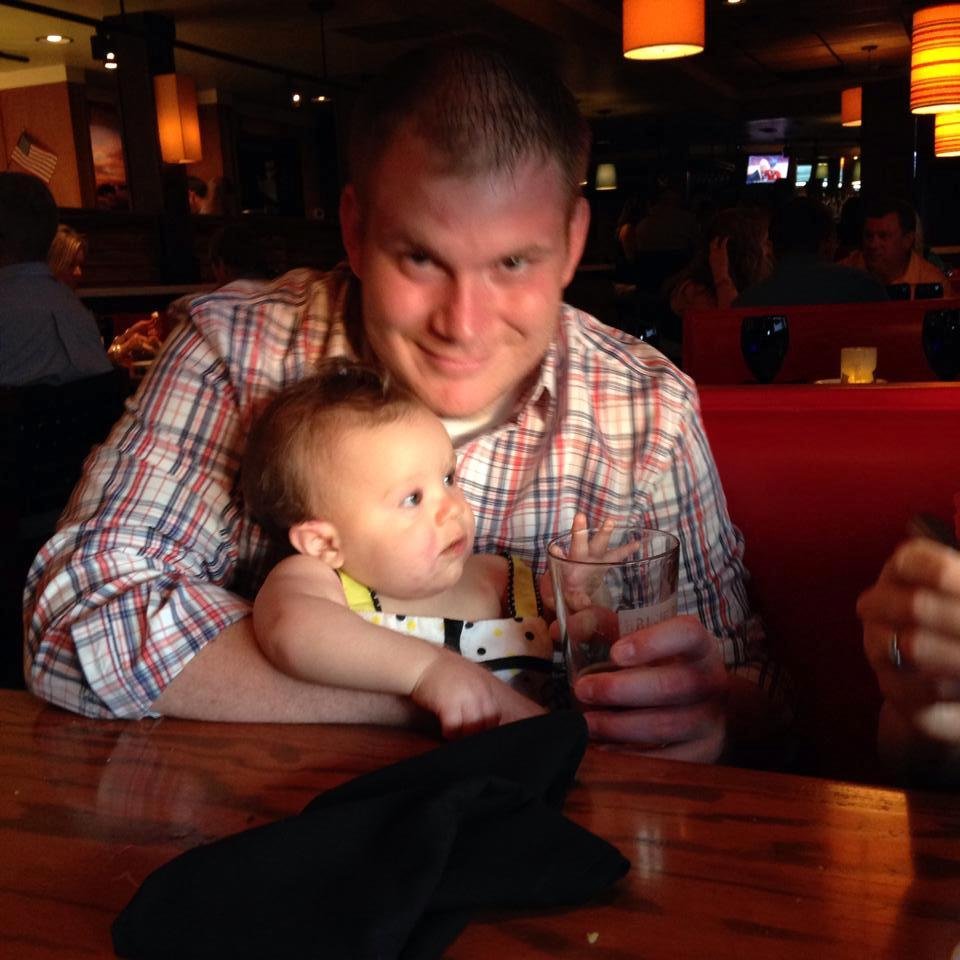 Having dinner - happy with Daddy - feeling just fine
