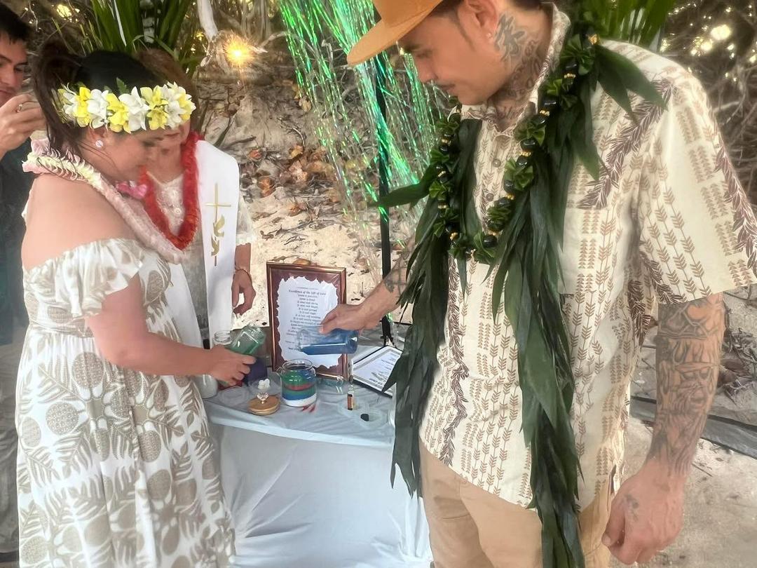 A special day as the knight Shane in armor meet the princess Darcia as they wed at the Royal Court at Turtle Bay Resort