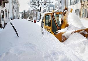 Remember to put your wipers up when it snows...........So you can find your car! (news photo)