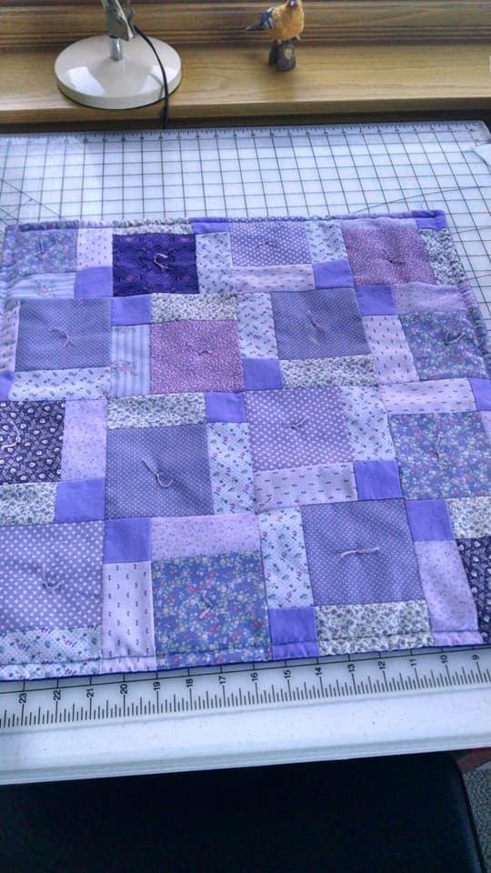 Finished a doll Quilt.
