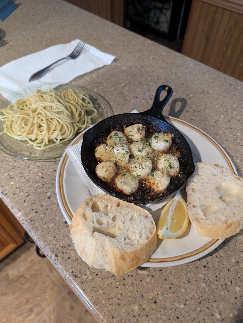 My version of Rachael Rays scallops with a side of pasta with a garlic butter pesto sauce.