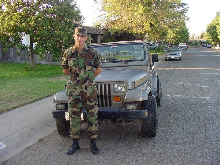 Jason and his Jeep in his reserves uniform 2006.