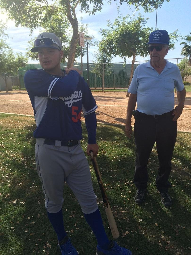 Alex Verdugo and his Godfather and uncle Dennis Schwinghammer. By Carol Smith