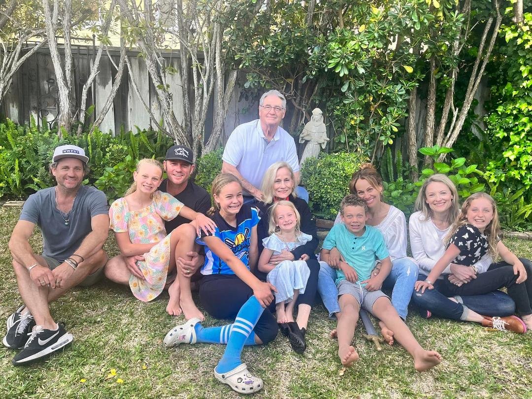 Annual Easter  family Pic. Same place, sane laps every year. Youngest was 3 weeks old in 1st pic and is 7 now.
