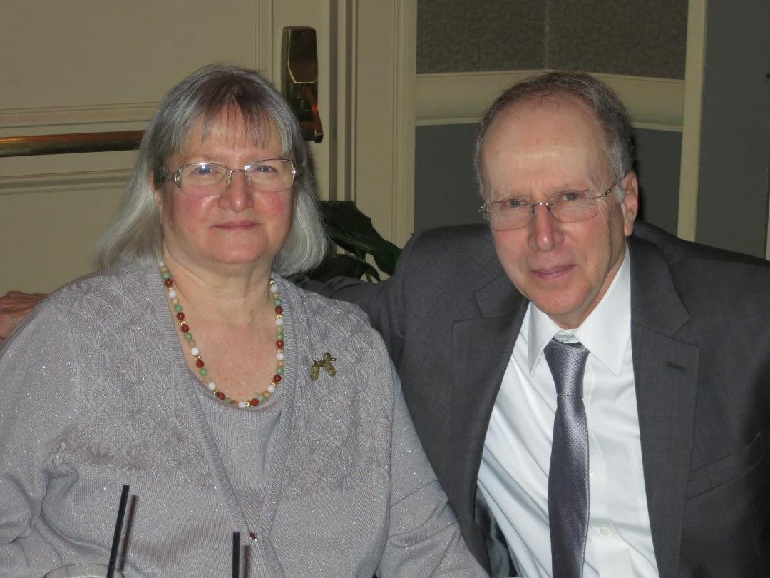if I wasn't so technologically challenged, I could show a little bit larger picture of myself and my husband, but this is the best I could do.  Found it attached to an old email -