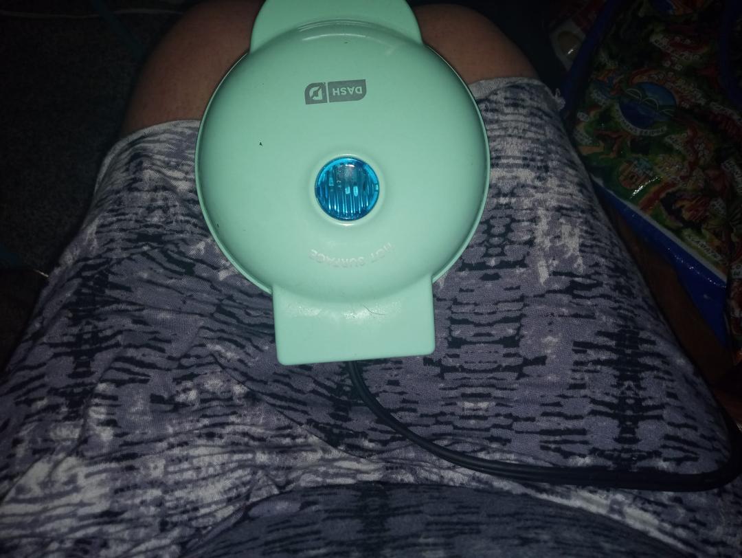 I LOVE my my waffle iron and now it has a little baby waffle iron to go with it. I have never seen a little mini waffle maker the thing is so cute I found it in a free box
