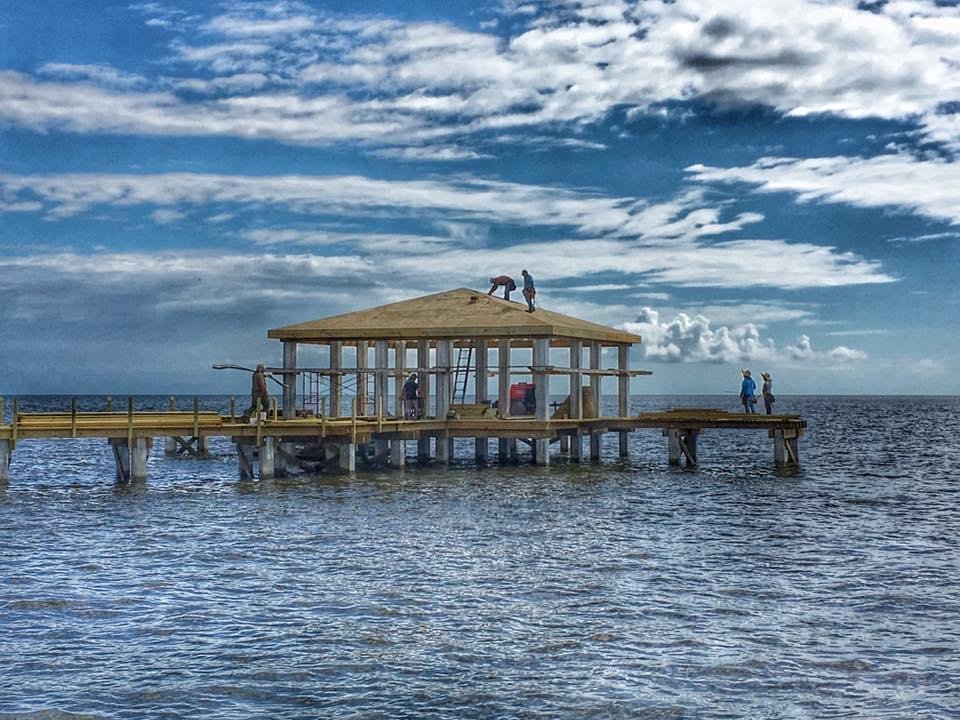 Finally rebuilding the pier and pavilion in The Harbor; eleven years after Katrina👍
