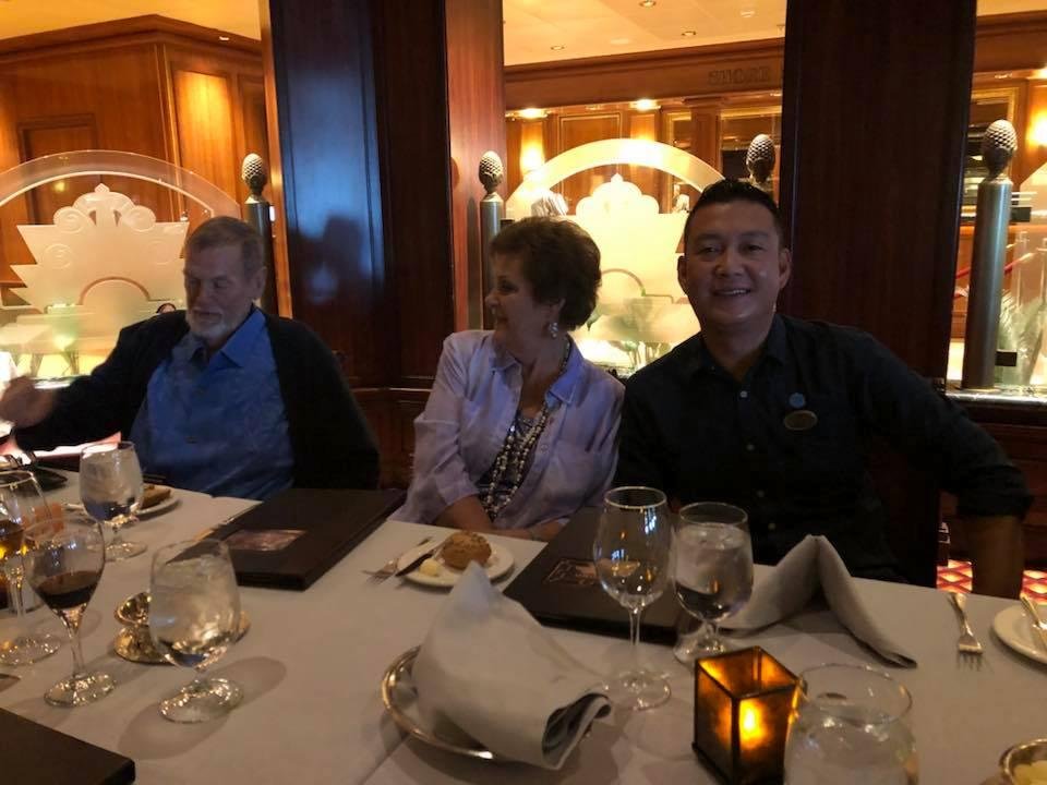Dinner with Reed Royo, our favorite bartender onboard! Plus balloon drop party in the Piazza.