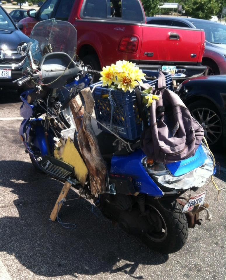 "Scooter for sale, gently used".
Saw this at Home Depot today. The wood kick stand was especially noteworthy not to mention the wire holding the windscreen together.
Frankly, I am impressed the owner got it to the parkin