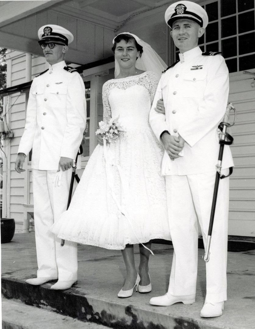 My parents were married at the American Consulate in Yokohama, Japan on May 19, 1956. This photo is from a wedding ceremony about 2 weeks later. The guy with the glasses was best man. The swords were part of the Naval Offic