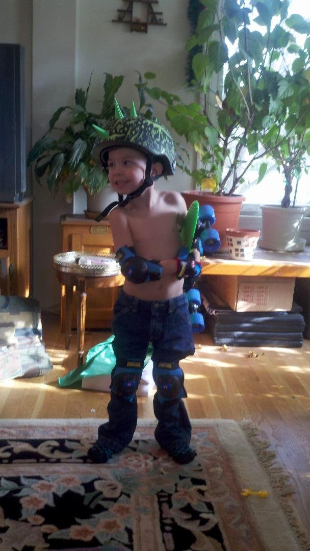 Jr is ready to take his skateboard for a spin